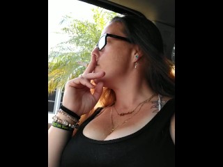 Nerdy cougar Smoking ciggies In car