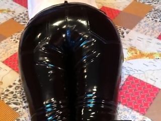 Squeezingmy booty in glossy PVC trousers