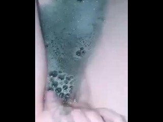 Gf toying with herself until she has an ejaculation in the bathtub
