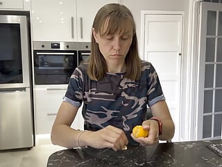 Invitingly tonguing an orange