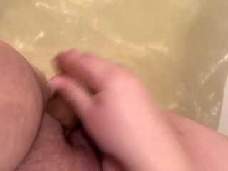 Obese wifey with fake penis in tub
