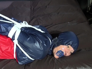 Strapped, Pantygagged and masked in Rainwear